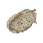 I Am The Very Model Of A Modern Major-General. I’ve Information Vegetable, Animal, & Mineral. | Lush Summer Fresh 2026 Range A medium circular swatch of some thick, textured creamy beige face mask that has some pieces of dark black seaweed running through it, on a white background.