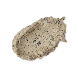 A medium circular swatch of some thick, textured creamy beige face mask that has some pieces of dark black seaweed running through it, on a white background.