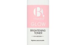 A tall cylindrical bright white plastic bottle with a bright pink plastic lid and a gradient bright pink and white label that has B. written in bright white writing, Brightening Toner written in bold black writing, and a picture of a bright pink stripe on it, on a white background.