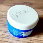 Hydrating My Skin In Three Different Ways | CeraVe Hydrating HA Water Gel Moisturiser | Gifted A short cylindrical bright blue plastic tub with a bright white plastic lid and a bright white label that has Cera written in bright white writing, Ve written in bright blue writing inside a slanted bright white rectangle, Hydrating HA Water Gel written in bright white writing inside a bright blue rectangle, and CeraVe engraved on it, on a light wooden worktop.