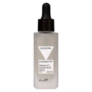 A short rectangular clear frosted glass bottle with a black rubber pipette lid and a white label that has Boots Modern Chemistry Glow 10% Vitamin C Serum with Ferulic Acid written in bold black writing on it, on a white background.