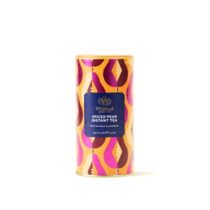 A tall cylindrical bright Brown, Magenta, Pink, Orange and Yellow abstract patterned cardboard tube with a bright yellow plastic lid and a bright blue label that has Whittard of Chelsea written in bright gold writing and Spiced Pear Instant Tea written in bright white writing on it, on a white background.